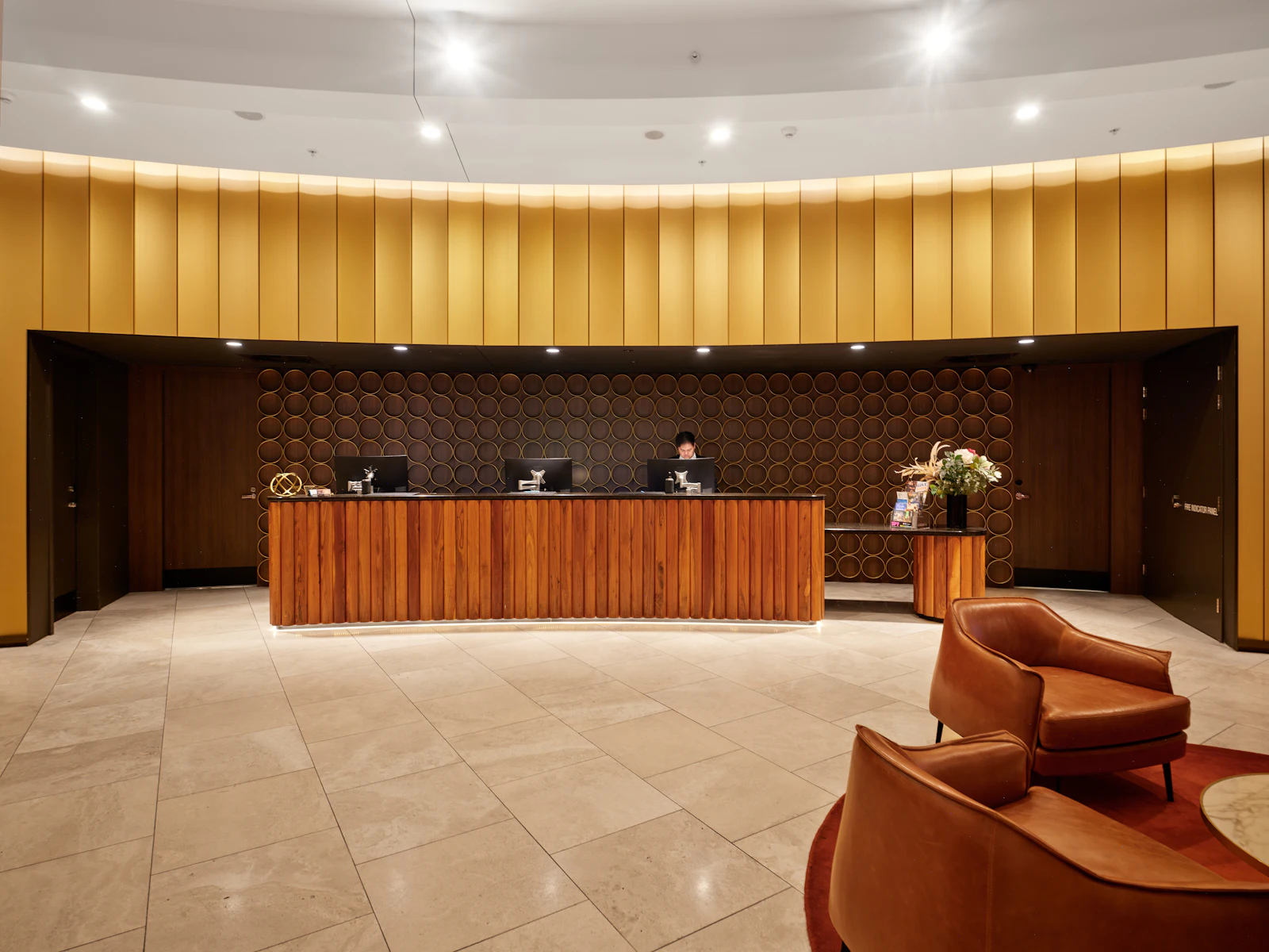 A hotel reception desk and lobby.